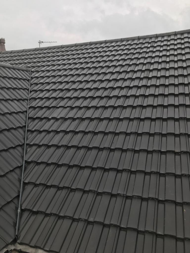 Concrete tiled roof installed by Alpine Roofing Liverpool.